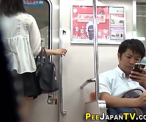 Asians peeing on spycam