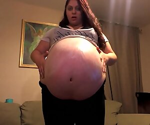 ample pregnant gal in Tight Clothes